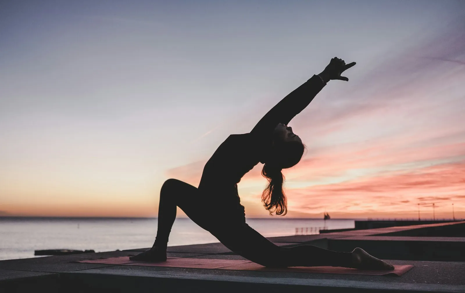 Postpartum Yoga: When to Start, What to Do, & Poses